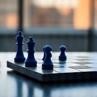 Chess pieces on a board, symbolizing strategic planning.
